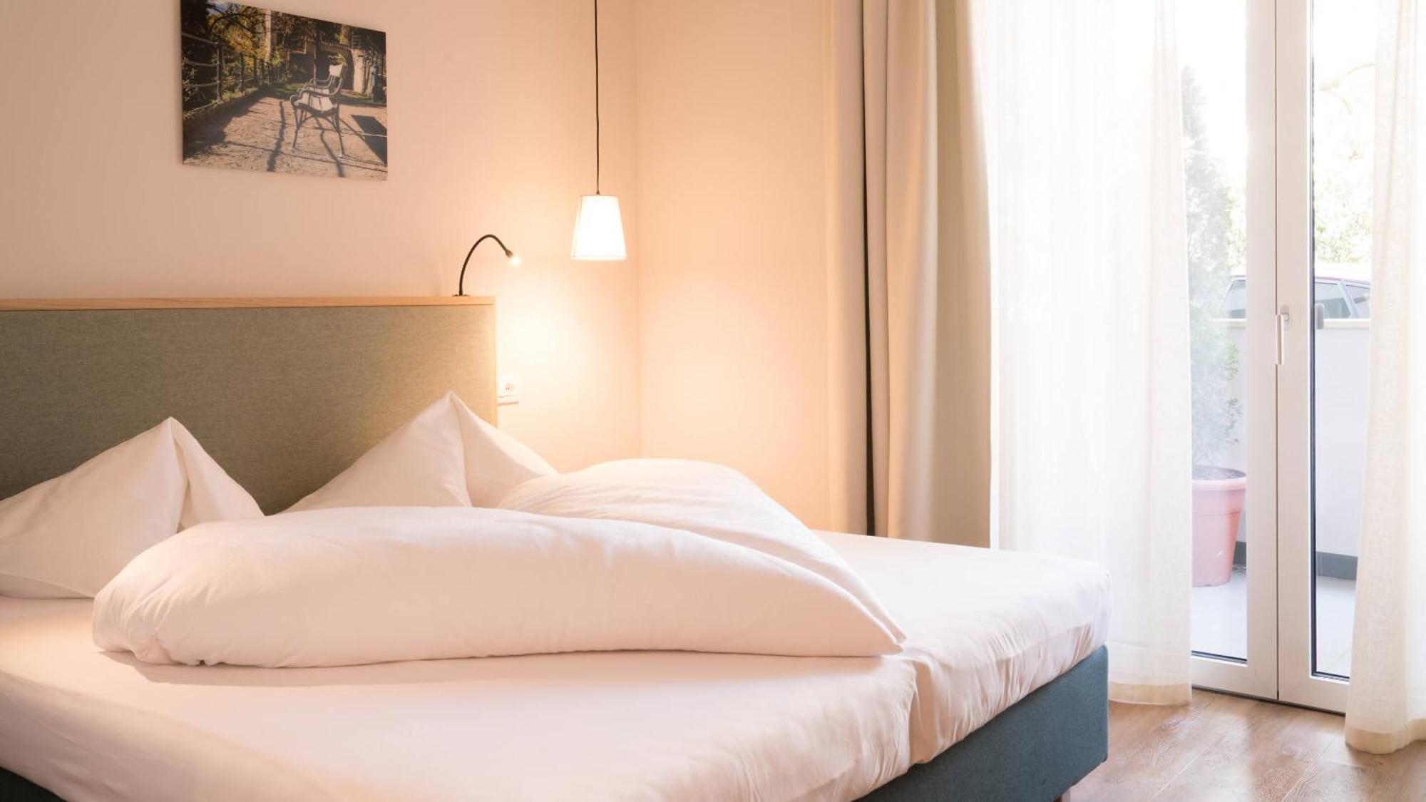 Flora Hotel & Suites Мерано Экстерьер фото
